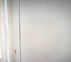 Fine crack visible at an internal wall corner